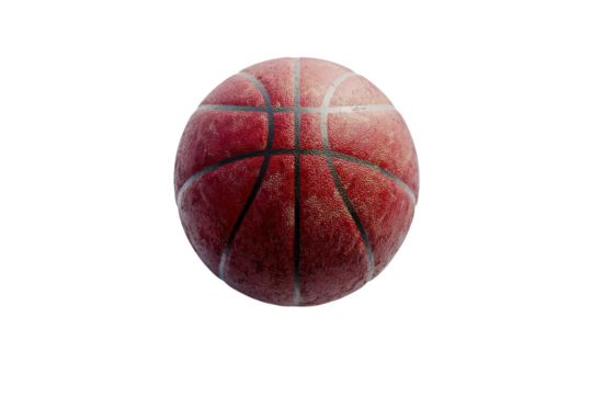 Bright red basketball rests on a flat surface highlighting its texture and stitching details