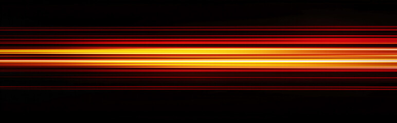 Fototapeta premium Horizontal gradient of red and yellow light lines on a black background, creating an abstract gradient effect with a blurred motion effect. The red color is bright, while the golden tone adds depth.