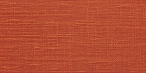 Fototapeta premium zoomed-in view of orange fabric texture with fine details soft natural lighting clean and bold design