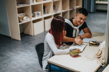 Two students are working together on a project in a modern school library setting, sharing ideas and learning collaboratively. The atmosphere reflects focus, teamwork, and academic engagement.