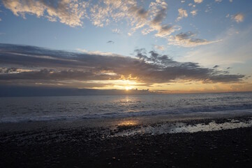 Sunset on the seashore. Evening twilight.