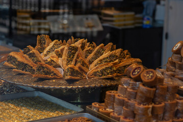 Wide selection of exotic oriental sweets including baklava, toffees and dry fruits in markets...