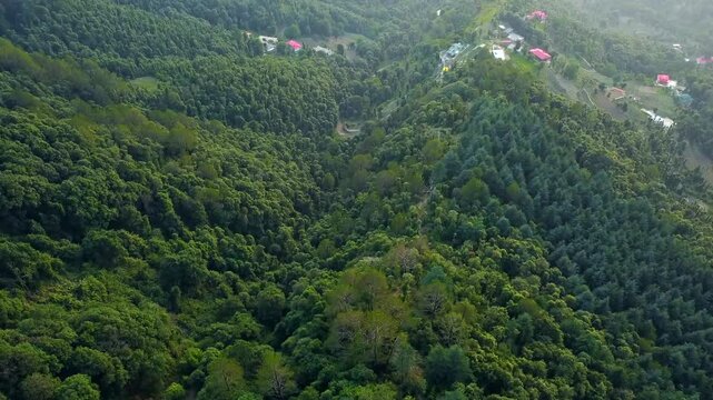 Aerial view of shoghi small suburban town in the district of solan about 15 kilometers from shimla along the famous kalka-shimla railway and national highway in himachal pradesh India.