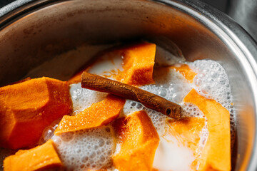 pumpkin pieces stewed with milk and a cinnamon stick, pumpkin mousse recipe