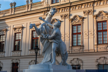 Obraz premium Stone horse tamer statue before Upper Belvedere palace, Vienna, Austria