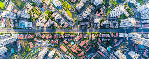 Obraz premium Aerial Cityscape Illustration: Urban Development, High-Rise Buildings, Roads