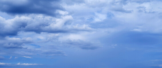 Obraz premium blue sky with blue rainy clouds on the background. Panorama of the sky