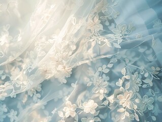 Fototapeta premium Soft, sheer white lace fabric with floral embroidery, draped and backlit.