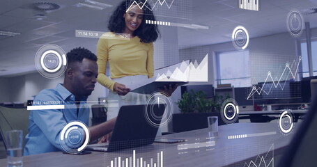 Business data analytics image over diverse colleagues collaborating in modern office