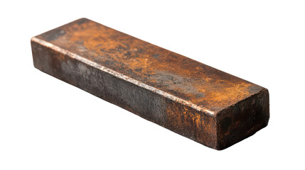 Fototapeta premium A weathered metal ingot resting on a surface, showcasing rustic charm and industrial history at sunset