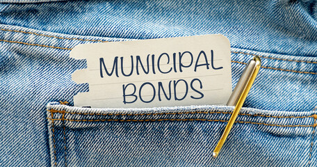 Inspirational Quote: Municipal Bonds. With text message on white paper in pocket with pen on blue...