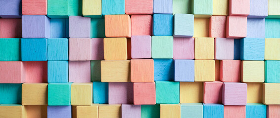 3D banner abstract colorful wooden pastel colorful blocks pattern background, world autism day concept. Copy space.