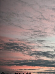 Obraz premium Dark Moody Cloudy Blue And Red Sky at Sunset Rainclouds