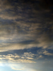 Fototapeta premium Dark Moody Cloudy Blue And Red Sky at Sunset Rainclouds