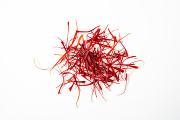 Naklejka premium Dried bright red saffron isolated on white background.