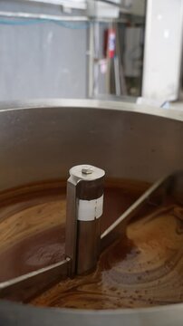 a machine that works in a factory to produce food raw materials