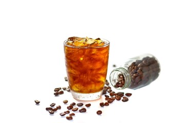 Americano ice coffee put on white background and coffee beans spread isolated concept.