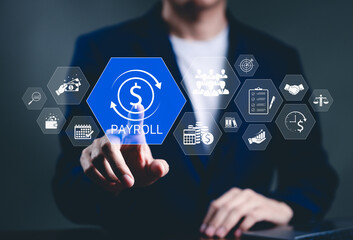 Payroll Management and Financial Processing System. Businessman works on payroll management with...
