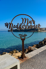 Tarifa, Spain - August 03, 2024: Symbol of the Mediterranean Sea in Tarifa, Spain. 