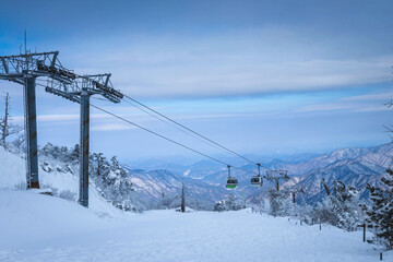 Cable car atop the snow-capped Deogyusan mountains at deogyusan national park near Muju, South Korea.