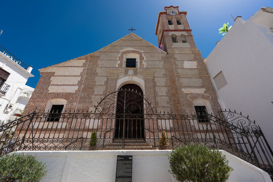 Frigiliana, Spain - August 07, 2024: White village of Frigiliana, Andalusia, Spain. Church of Saint Anthony of Padua