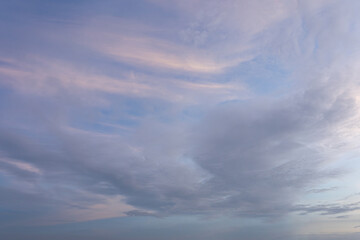 Fototapeta premium Serene Sunset Sky Pastel Cloudscape Background