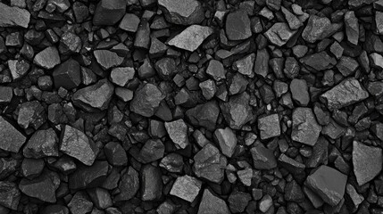 Granite gravel texture dark gray background for construction and landscaping projects in a natural earthy setting