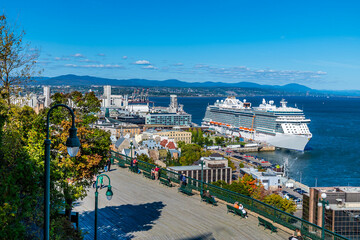 Fototapeta premium A view down from the Dufferin terrace towards the cruise terminal in Quebec city, Canada in the fall