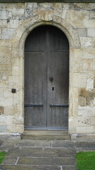 Historic wooden door in a wall
