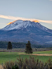 Fototapeta premium Road towards Mounts Shasta and Shastina in California, United States Highway 97 in Northern California heading South toward a mountain called Shasta volcano, USA