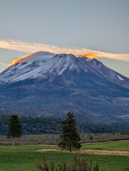 Fototapeta premium Road towards Mounts Shasta and Shastina in California, United States Highway 97 in Northern California heading South toward a mountain called Shasta volcano, USA