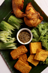 indonesian traditional food culinary business fried chicken ayam goreng cucumber chili sauce asian