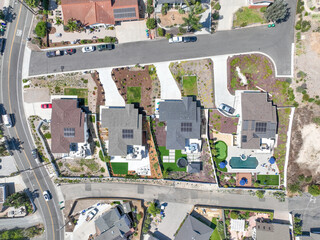 Aerial view of middle class houses in the valley of Oceanside town in San Diego, California. USA.