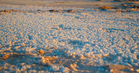 Salt remains of large endorheic salt lake Chott el Djerid in Tunis. Deserted lake because of...