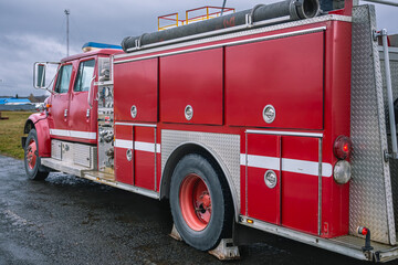 A fire truck for the delivery of firefighters to the place of fire and the supply of extinguishing...