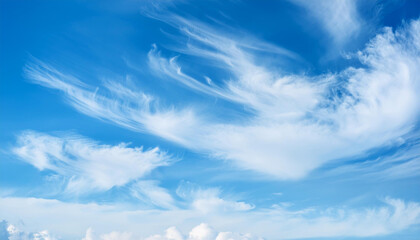 Fototapeta premium sky bule, light blue clouds evoke a gentle, calming springtime atmospher