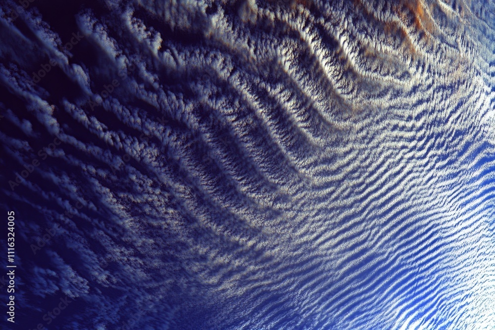 Poster striking aerial view of wispy clouds forming unique patterns against deep blue sky captured from spa