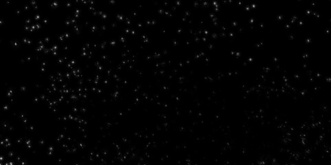 Obraz premium Snowfall bokeh Lights on black background, real snowflakes isolated on black or white background, snow on a black background texture overlay bokeh highlights, Abstract bokeh lights with soft light.