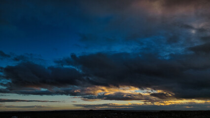 Panoramic View of Twilight Sky with Layered Clouds