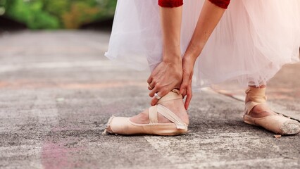Ballet, ankle pain and Injury with feet of woman in street of Japan for steps, first aid and joint ache. Dancing, talent and ballerina with closeup of person in city for fibromyalgia and accident