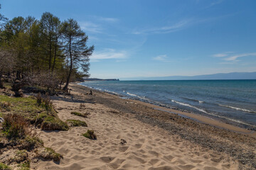 Obraz premium Beautiful view from the shore of Lake Baikal near Kharantsy village. Baikal lake, Olkhon island, Kharantsy village, Irkutsk region, Russia.