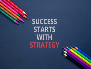 Success starts with strategy symbol. Concept words Success starts with strategy on beautiful black...