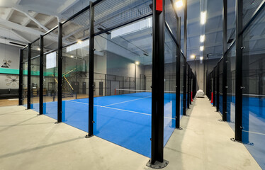 Padel court with lines and net indoor