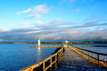 Fototapeta premium Sunrise seen from the Pembroke Marina on the Ottawa River in fall room for text 
