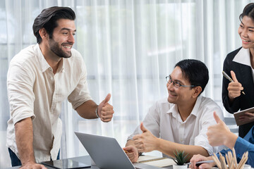 Data analysts team of office worker collaborate on business intelligence BI dashboard to analyze...