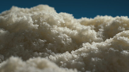 Pulp of white bread looking like clouds. Complex surface texture. Macro shot. 
