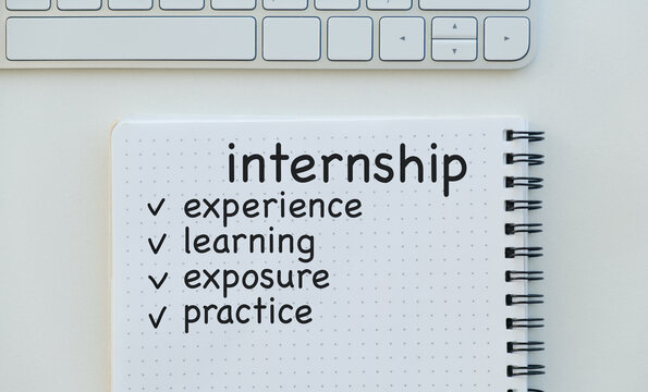 A spiral notebook with the word internship written on it
