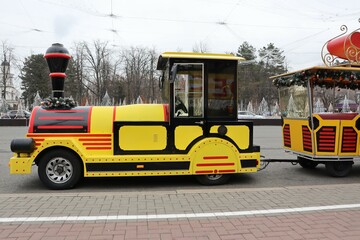 Enjoy a vibrant and colorful Mini Train specifically designed for children at the Amusement Park
