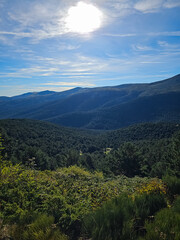 The path to the summit of Pe&ntilde;alara reveals stunning vistas of the surrounding mountains and lush vegetation. A hiker's paradise.