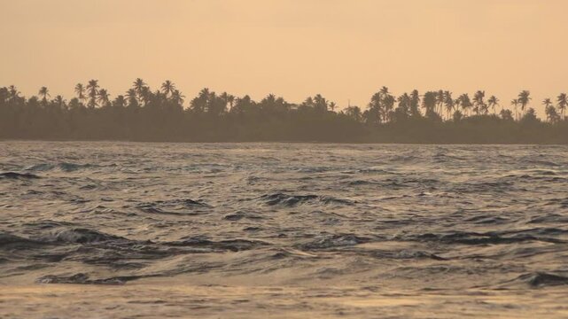 Waves in slow motion at sunset off the tropical San Blas Islands